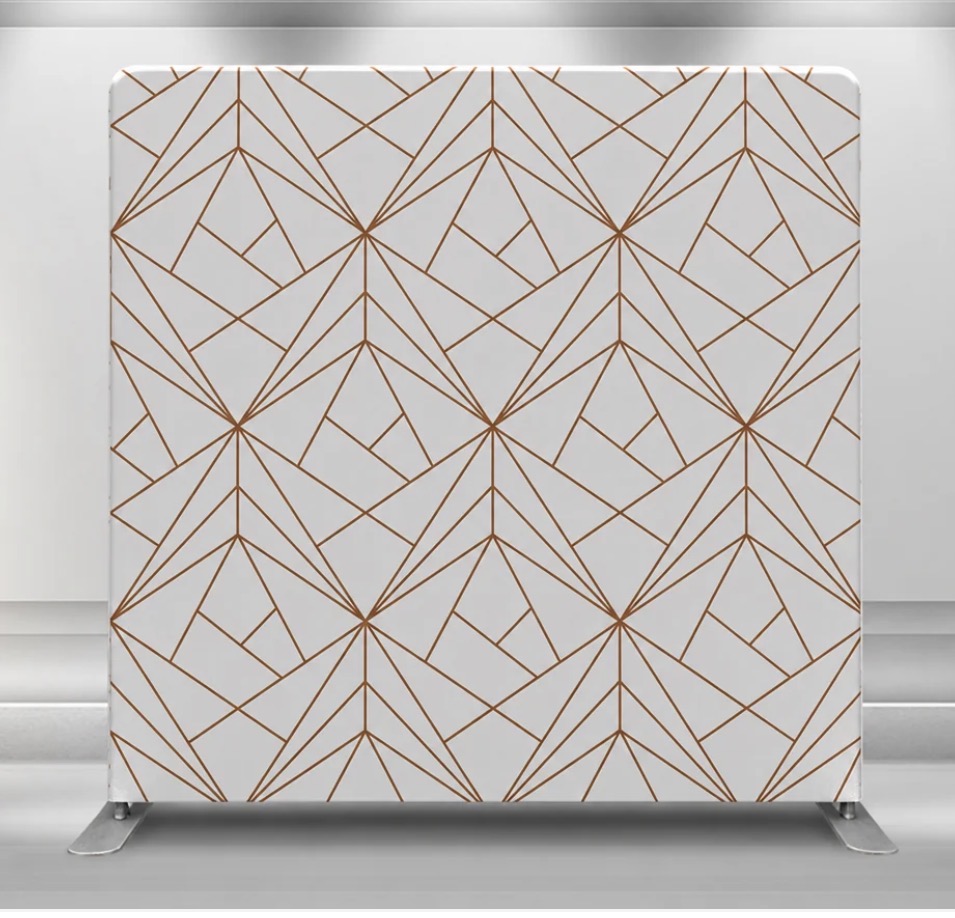 The White & Gold backdrop — a white panel with a gold geometric line design